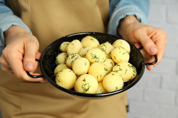 Concept of tasty food with boiled young potatoes, close up