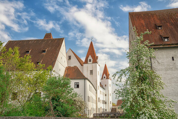 Fototapeta na wymiar beautiful view of a castle in germany, old town in Ingolstadt, sakura blossom