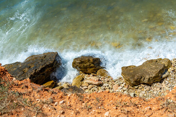 Aerial view of sea waves and rocky shore.Sea coast, vacation.
