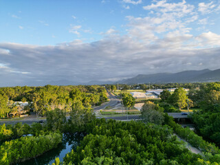 Aerial view of Cairns botanical garden and mountains at sunset