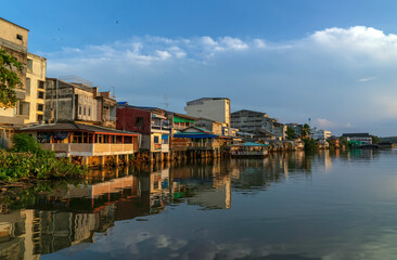 Fototapeta na wymiar Waterfront house, Bang Nara River, Narathiwat, Thailand.
