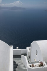 Stunning view from a luxury whitewashed hotel in Imerovigli Santorini