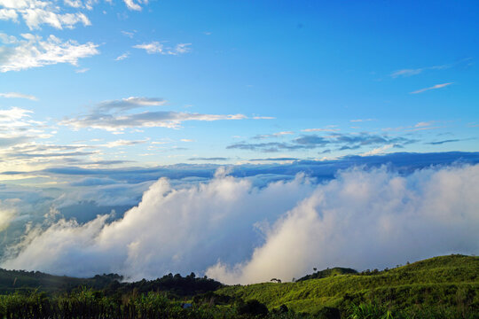 Landscape white cloud or fog  clover on the green mountain on cloudy day - abstract background nature scene - white light of sunrise - image from Chang Moob, Doi tung, Ching Rai
