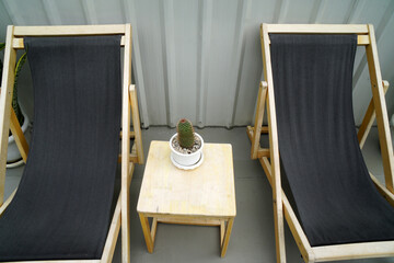 Garden chair on wooden floor in Rice field garden park and outdoor -  exterior design vintage style - relax and chilling  vibe - image from chiang rai thailand