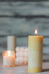 A variety of candles in a bright interior