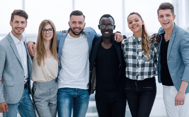 Fototapeta premium Casual group of people standing isolated over white background
