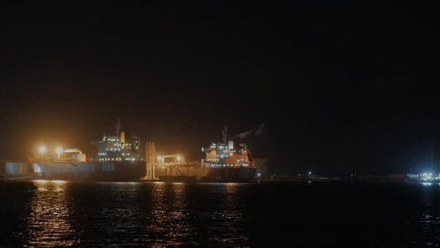 Night sighting of cargo ships docked at Autonomous Port of Dakar - Port Autonome de Dakar, Senegal