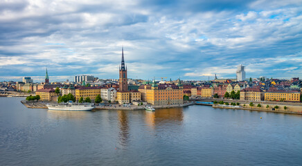 Fototapeta na wymiar Panoramic view of Riddarholmen island - the part of Stockholm Old Town (Gamla Stan) from Sodermalm top, Sweden.