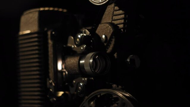 Vintage 8mm Projector showing a movie 4K