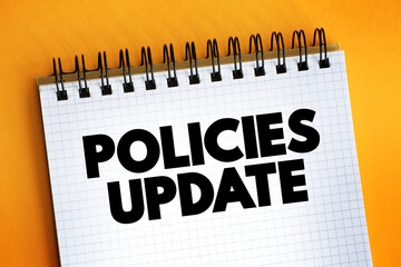 Policies Update text on notepad, concept background
