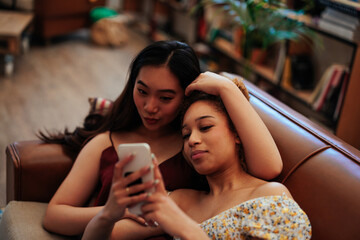 Young Adults lifestyle using mobile phone at home