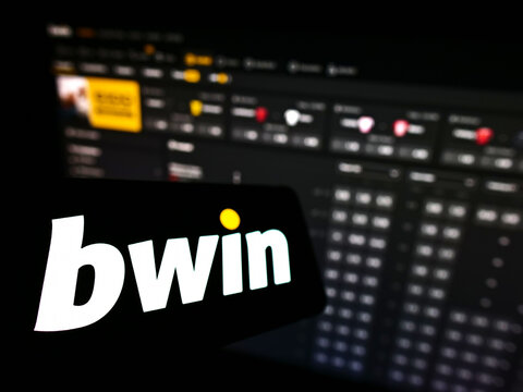 Stuttgart, Germany - 01-08-2022: Smartphone with logo of Austrian company bwin Interactive Entertainment AG on screen in front of business website. Focus on left of phone display.