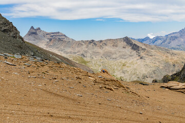 Excursion to the Gran Paradiso in the Alps. Search for rocks, minerals and precious stones. Study of the surface of rocks with sedimented debris over time. Lunar landscape, Martian landscape.