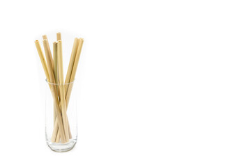 Reusable bamboo straws arranged in a glass, set against a clean white background. Plenty of space for customization! Add your own text, logo, or graphics to create impressive presentations.