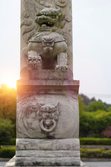 Beasts carved on stone column