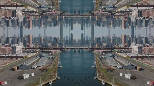 Forwards fly above water surface in industrial borough, downtown skyscrapers in background. Abstract computer effect digital composed footage