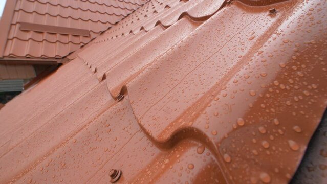 Rain Hitting Modern House Roof Tiles during Thunderstorm Water Drops Close Up