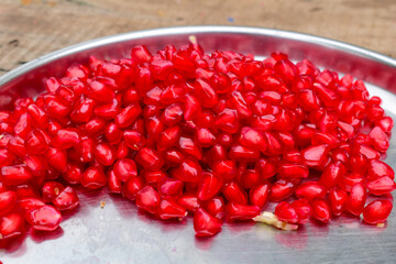 close up of fresh organic pomegranate seed