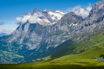 Fototapeta na wymiar Hiking on the Eiger trail between Grindlewald and Wengen in the Swiss Alps