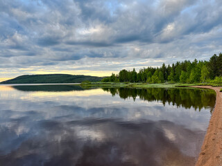 Fantastic sky reflection on the lake surface, north lake, fantastic cloudy sky, twilight 