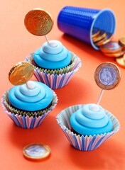 Financial bank party cupcake on party background.