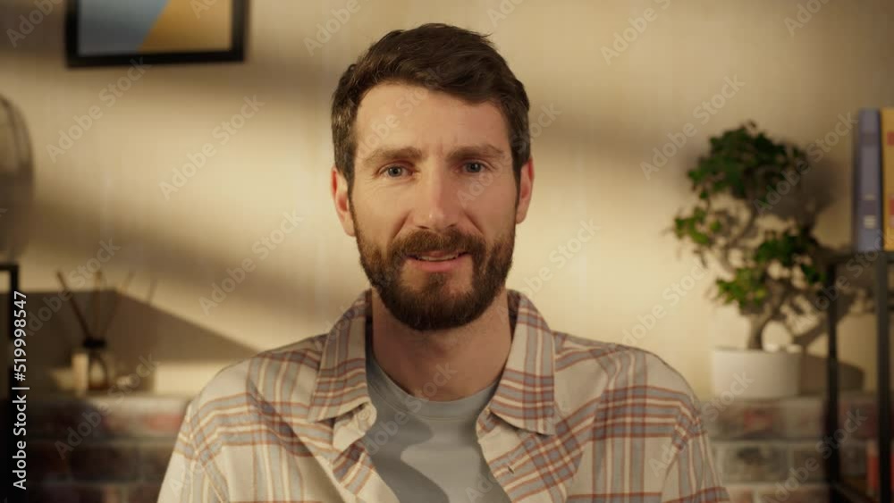 Aufkleber point of view from camera with handsome caucasian man making a video call from home living room. hap