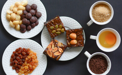 Delicious chocolate brownie homemade, ingredients of brownie,closeup fudge brownie,homemade bakery and dessert,Pieces of fresh brownie,confectionery concept.
