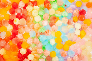 Frozen fruit juice. Multi Colored ice cubes. Rainbow ice for cocktail or summer refreshing drinks. Design element