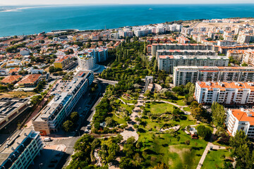 Lisbon, Portugal - July 29, 2022: Aerial drone view of Parque dos Poetas in Oerias, translated to...