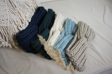 Headbands crocheted knitted in the interior on the couch, product listing for sale