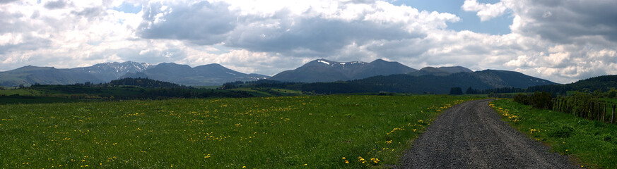Panoramic view of the Chaîne des Puys du Sancy in summer. Auvergne, France