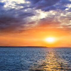 calm lake at the dramatic sunset, natural summer outdoor scene