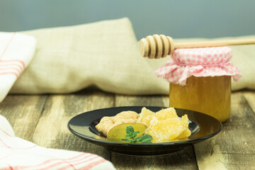Fresh ginger root and candied ginger in sugar