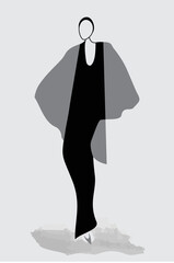 A stylishly dressed woman strikes a high fashion pose.