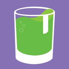 glass with green liquid on purple background