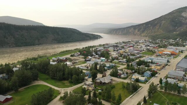 Aerial view of Dawson City, the territory of Yukon, Canada. Historic city, Klondike Gold Rush history. Summer, overcast day