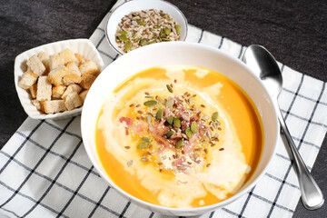 Pumpkin soup with cream and bacon