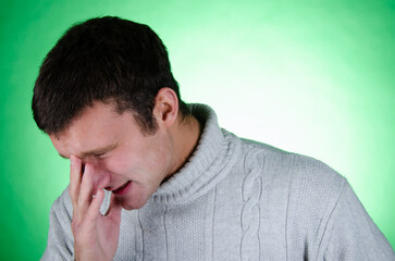 Young attractive student is thinking.	