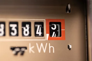 Foto op Aluminium Analog electricity meter for households. Measuring used electricity in kWh ( kilowatt hour ) © Westlight