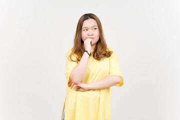 Thinking gesture of Beautiful Asian Woman wearing yellow T-Shirt Isolated On White Background
