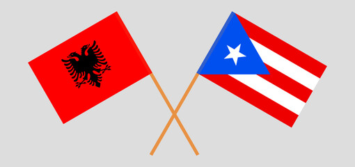 Crossed flags of Albania and Puerto Rico. Official colors. Correct proportion