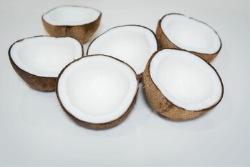 Fototapeta na wymiar Coconuts isolated on a white background. Selective focus.