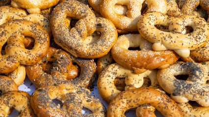 Homemade Soft Pretzels with Salt on a wooden board.