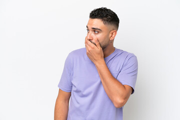 Young Arab handsome man isolated on white background doing surprise gesture while looking to the side