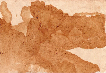 paper painted with coffe. texture background paper dyed with coffee