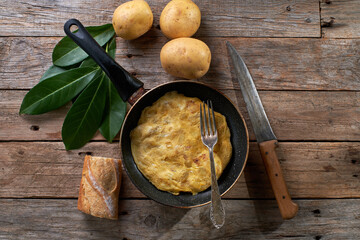 Freshly made potato omelette in frying pan