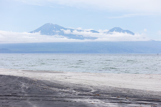 Beach line of Iturup landscape. Volcano of Bohdan Khmelnitsky. Russia, Sakhalin region, Kuril Islands.