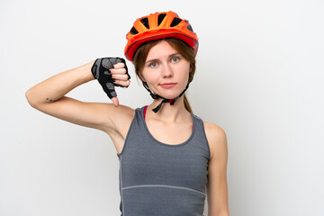 Young cyclist English woman isolated on white background showing thumb down with negative expression