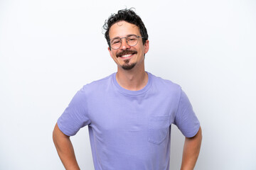 Obraz premium Young man with moustache isolated on white background posing with arms at hip and smiling