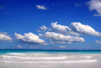 Fototapeta na wymiar Travel background with Caribbean sea and clouds sky.
